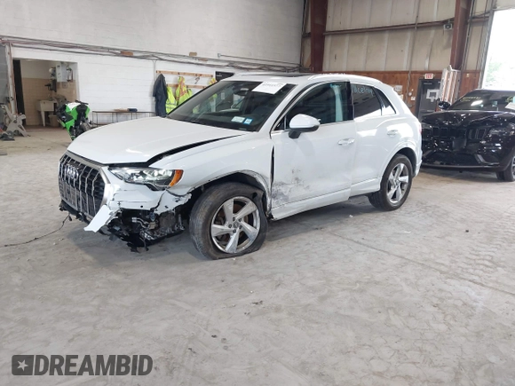 2020 Audi Q3 Premium with VIN WA1AECF3XL1090825, listed as a IAAI auction lot 42541577 with 32,432 mi miles and . Bid and sale history available at DreamBid. Image 19.