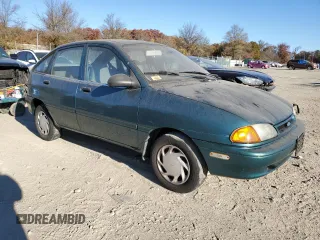 1996 Ford Aspire z VIN KNJLT06H0T6195551, wystawiony jako Copart lot #79450694 z przebiegiem 887 992 mil mil oraz Tytuł czysty. Historia ofert i sprzedaży dostępna na DreamBid. Obrazek 4.