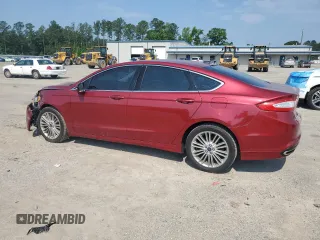 2015 Ford Fusion SE z VIN 3FA6P0H97FR288087, wystawiony jako Copart lot #57446515 z przebiegiem 87 472 mil mil oraz Szkoda całkowita • Salvage title. Historia ofert i sprzedaży dostępna na DreamBid. Obrazek 2.