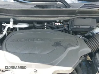 2021 Honda Pilot Touring 7-Passenger z VIN 5FNYF6H63MB088594, wystawiony jako IAAI lot #39837443 z przebiegiem 70 415 mil mil oraz . Historia ofert i sprzedaży dostępna na DreamBid. Obrazek 19.