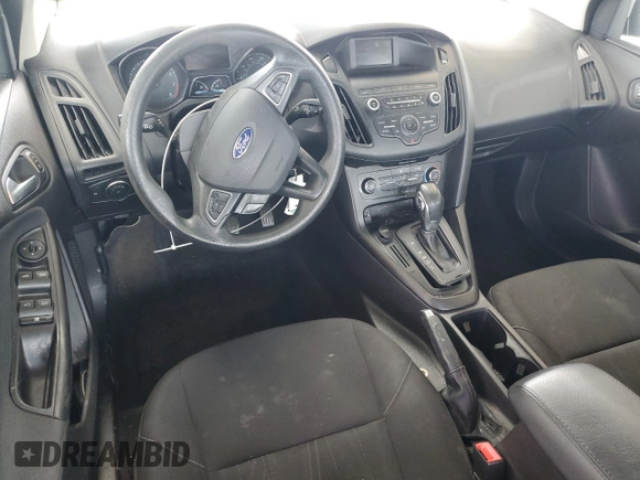 2018 Ford Focus SE z VIN 1FADP3F25JL265168, wystawiony jako Copart lot #56541895 z przebiegiem Nie podano mil oraz Szkoda całkowita • Salvage title. Historia ofert i sprzedaży dostępna na DreamBid. Obrazek 8.