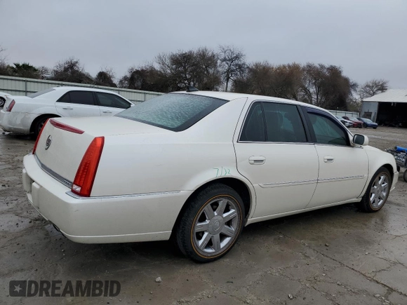 2011 Cadillac DTS with VIN 1G6KA5E63BU150750, listed as a Copart auction lot 43568135 with 100,117 mi miles and Salvage Title. Bid and sale history available at DreamBid. Image 3.