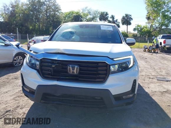 2021 Honda Ridgeline RTL-E with VIN 5FPYK3F7XMB011525, listed as a IAAI auction lot 41774012 with 98,031 mi miles and . Bid and sale history available at DreamBid. Image 12.