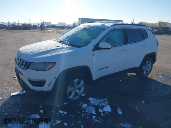2019 Jeep Compass Latitude with VIN 3C4NJDBB5KT704564, listed as a IAAI auction lot 40768531 with 95,291 mi miles. Bid and sale history available at carsss.com. Image 17.