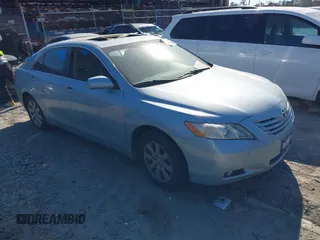 2007 Toyota Camry LE z VIN JTNBK46K473004804, wystawiony jako IAAI lot #41858473 z przebiegiem Nie podano mil oraz . Historia ofert i sprzedaży dostępna na DreamBid. Obrazek 1.