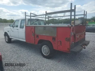 1996 Ford F-250 with VIN 1FTHX25HXTEA92699, listed as a Copart auction lot 58211345 with 396,760 mi miles and Clean title. Bid and sale history available at DreamBid. Image 2.
