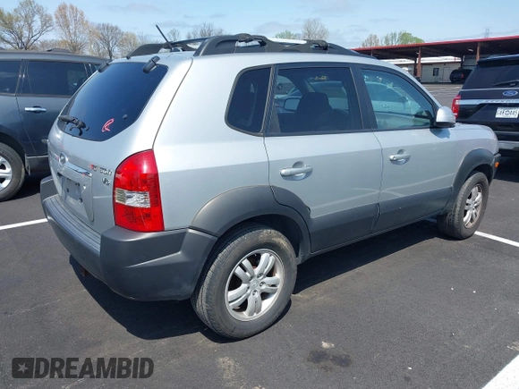 2007 Hyundai Tucson SE with VIN KM8JN12D37U672371, listed as a IAAI auction lot 41925218 with 222,434 mi miles. Bid and sale history available at carsss.com. Image 4.