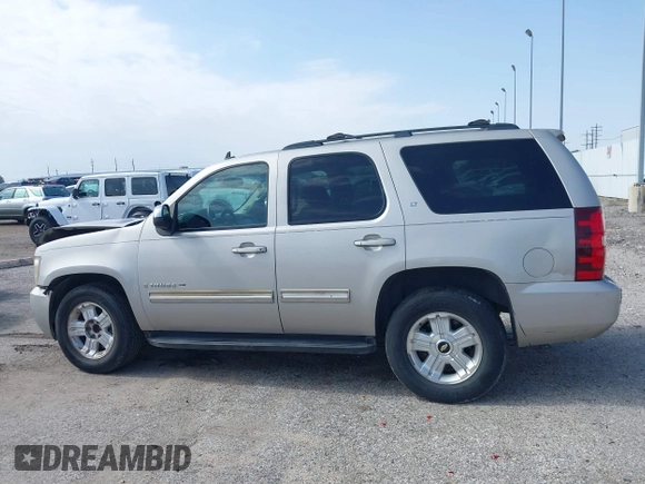 2009 Chevrolet Tahoe 2LT z VIN 1GNEC23379R258434, wystawiony jako IAAI lot #41558672 z przebiegiem 133 646 mil mil oraz . Historia ofert i sprzedaży dostępna na DreamBid. Obrazek 14.