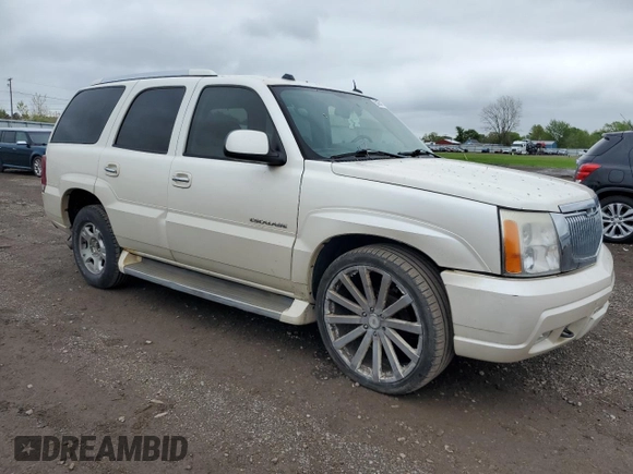 2005 Cadillac Escalade z VIN 1GYEK63N95R204674, wystawiony jako Copart lot #55854175 z przebiegiem 303 771 mil mil oraz Tytuł czysty. Historia ofert i sprzedaży dostępna na DreamBid. Obrazek 4.