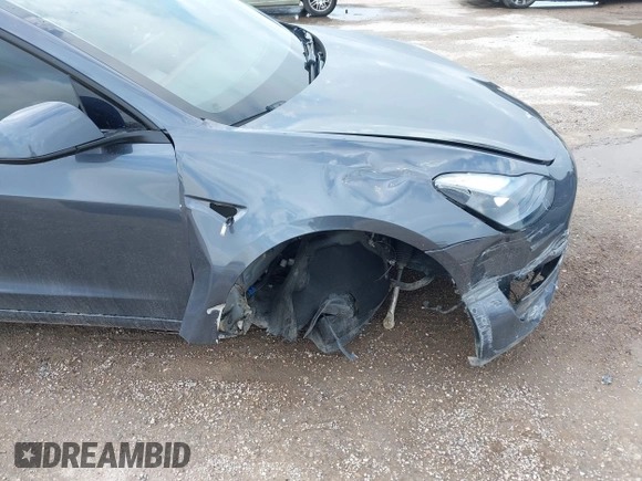 2023 Tesla Model 3 with VIN 5YJ3E1EA5PF676316, listed as a IAAI auction lot 42384765 with 33,715 mi miles and . Bid and sale history available at DreamBid. Image 6.