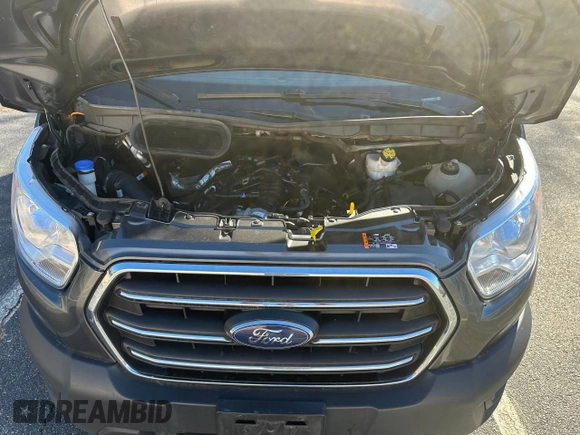 2020 Ford Transit Cargo with VIN 1FTBR1CG8LKA88110, listed as a Copart auction lot 80906414 with 150,897 mi miles and Clean Title. Bid and sale history available at DreamBid. Image 7.