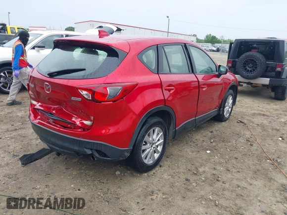 2015 Mazda CX-5 Sport with VIN JM3KE2BE5F0484326, listed as a IAAI auction lot 42186263 with 192,118 mi miles and . Bid and sale history available at DreamBid. Image 4.