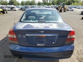 2001 Daewoo Nubira CDX z VIN KLAJB52Z31K647237, wystawiony jako Copart lot #69299834 z przebiegiem 51 513 mil mil oraz Szkody całkowita. Historia ofert i sprzedaży dostępna na DreamBid. Obrazek 6.