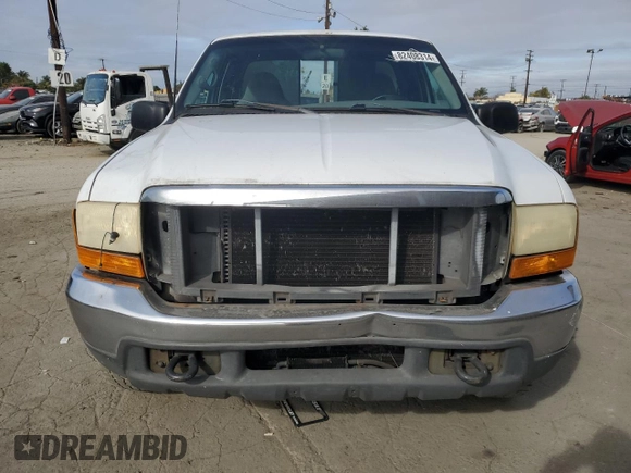 2001 Ford Super Duty F-250 XL with VIN 1FTNX20LX1EA37939, listed as a Copart auction lot 82408314 with 303,527 mi miles and Salvage Title. Bid and sale history available at carsss.com. Image 5.