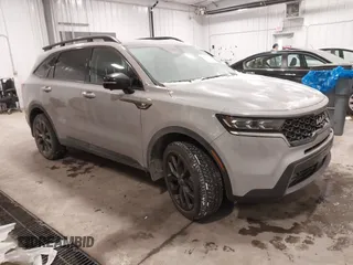 2023 Kia Sorento SX z VIN 5XYRKDLF0PG189570, wystawiony jako IAAI lot #41587404 z przebiegiem 22 006 mil mil oraz . Historia ofert i sprzedaży dostępna na DreamBid. Obrazek 1.