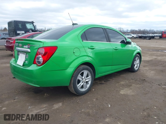 2015 Chevrolet Sonic LT with VIN 1G1JC5SH7F4104412, listed as a IAAI auction lot 41737655 with 124,304 mi miles and . Bid and sale history available at DreamBid. Image 4.