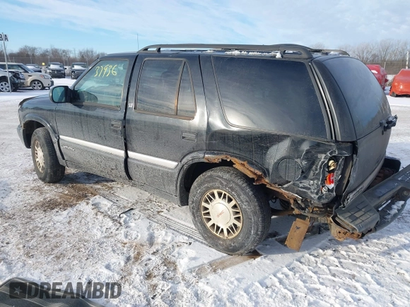 1999 GMC Jimmy SLE with VIN 1GKDT13W5X2520020, listed as a IAAI auction lot 41337936 with 277,615 mi miles. Bid and sale history available at carsss.com. Image 3.