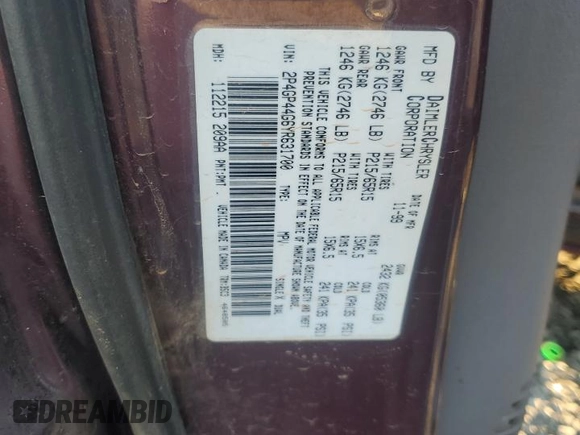 2000 Plymouth Voyager Grand SE z VIN 2P4GP44G6YR631700, wystawiony jako Copart lot #82873844 z przebiegiem Nie podano mil oraz Szkody całkowita. Historia ofert i sprzedaży dostępna na DreamBid. Obrazek 13.
