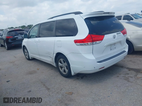 2014 Toyota Sienna LE AAS with VIN 5TDKK3DC0ES525654, listed as a IAAI auction lot 42153582 with 71,258 mi miles and . Bid and sale history available at carsss.com. Image 3.