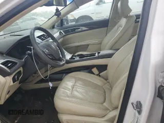 2014 Lincoln MKZ z VIN 3LN6L2GK9ER825882, wystawiony jako Copart lot #53332435 z przebiegiem 114 677 mil mil oraz Szkoda całkowita • Salvage title. Historia ofert i sprzedaży dostępna na DreamBid. Obrazek 7.