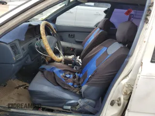 1990 Toyota Corolla z VIN JT2AE94A5L3323663, wystawiony jako Copart lot #71963834 z przebiegiem 354 386 mil mil oraz Szkoda całkowita • Salvage title. Historia ofert i sprzedaży dostępna na DreamBid. Obrazek 7.