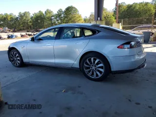 2013 Tesla Model S with VIN 5YJSA1DNXDFP04134, listed as a Copart auction lot 76516714 with 150,560 mi miles and Clean title. Bid and sale history available at DreamBid. Image 2.