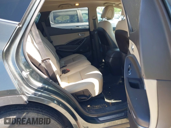 2014 Hyundai Santa Fe with VIN 5XYZUDLB0EG187984, listed as a IAAI auction lot 42607599 with 111,594 mi miles and . Bid and sale history available at DreamBid. Image 8.