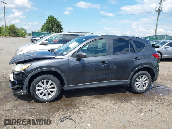 2015 Mazda CX-5 Touring with VIN JM3KE4CY9F0506879, listed as a IAAI auction lot 42209768 with 87,690 mi miles and . Bid and sale history available at DreamBid. Image 15.