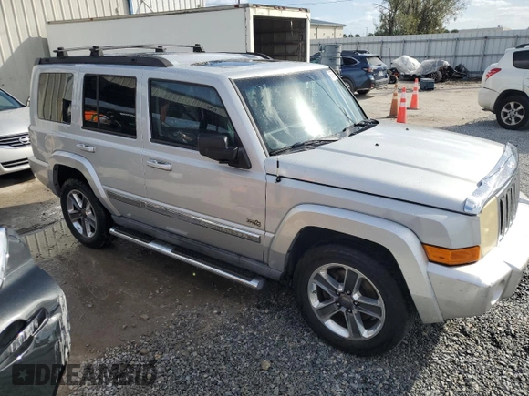 2006 Jeep Commander with VIN 1J8HH48K96C289162, listed as a Copart auction lot 80979074 with 170,581 mi miles and Salvage title. Bid and sale history available at DreamBid. Image 4.