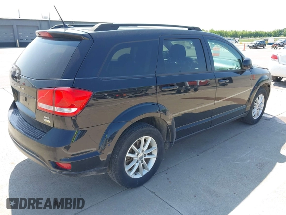 2017 Dodge Journey SXT with VIN 3C4PDCBG1HT523010, listed as a IAAI auction lot 42404624 with 198,519 mi miles and . Bid and sale history available at DreamBid. Image 4.