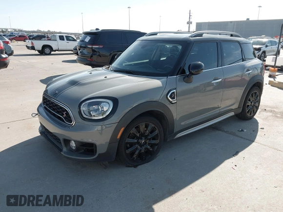 2018 MINI Countryman Cooper S z VIN WMZYT3C35J3E93291, wystawiony jako IAAI lot #41281432 z przebiegiem 58 774 mil mil oraz . Historia ofert i sprzedaży dostępna na DreamBid. Obrazek 2.