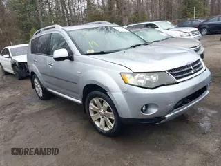 2009 Mitsubishi Outlander SE z VIN JA4MT31W89Z003101, wystawiony jako IAAI lot #41487678 z przebiegiem 90 226 mil mil oraz . Historia ofert i sprzedaży dostępna na DreamBid. Obrazek 1.