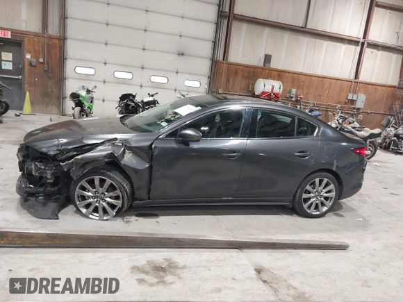 2020 Mazda 3 Premium with VIN 3MZBPBEM3LM123091, listed as a IAAI auction lot 41568213 with 68,515 mi miles and . Bid and sale history available at DreamBid. Image 15.