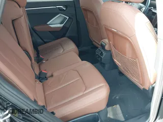 2021 Audi Q3 S line Premium z VIN WA1DECF33M1038760, wystawiony jako IAAI lot #42347743 z przebiegiem 26 675 mil mil oraz . Historia ofert i sprzedaży dostępna na DreamBid. Obrazek 8.
