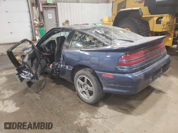 1991 Mitsubishi Eclipse with VIN 4A3CS54U5ME034104, listed as a Copart auction lot 82414954 with 474,141 mi miles and Salvage Title. Bid and sale history available at DreamBid. Image 2.