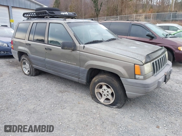 1996 Jeep Grand Cherokee with VIN 1J4EZ58S1TC112995, listed as a IAAI auction lot 41706966 with 356,727 mi miles and . Bid and sale history available at DreamBid. Image 1.