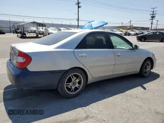 2004 Toyota Camry LE with VIN 4T1BE32K94U300544, listed as a Copart auction lot 60529005 with 223,940 mi miles and Clean title. Bid and sale history available at DreamBid. Image 3.
