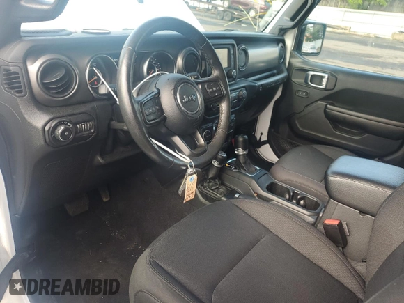 2021 Jeep Wrangler 80th Anniversary with VIN 1C4GJXAN9MW726831, listed as a Copart auction lot 55909084 with 23,602 mi miles and Salvage Title. Bid and sale history available at DreamBid. Image 8.