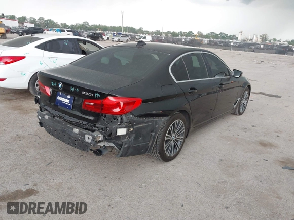 2019 BMW 5 Series 530i with VIN WBAJA5C58KWW11641, listed as a IAAI auction lot 41946359 with 48,635 mi miles and . Bid and sale history available at DreamBid. Image 4.