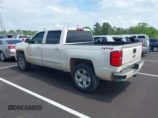 2015 Chevrolet Silverado 1500 LT with VIN 3GCUKREC1FG392218, listed as a IAAI auction lot 42094309 with 140,915 mi miles and . Bid and sale history available at DreamBid. Image 3.