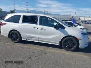 2023 Honda Odyssey Sport z VIN 5FNRL6H77PB011088, wystawiony jako IAAI lot #41883596 z przebiegiem 80 528 mil mil oraz . Historia ofert i sprzedaży dostępna na DreamBid. Obrazek 14.