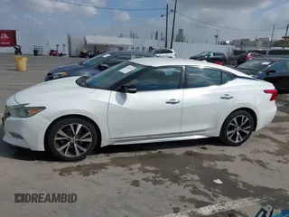 2016 Nissan Maxima S with VIN 1N4AA6AP2GC430689, listed as a IAAI auction lot 41913701 with 132,637 mi miles and . Bid and sale history available at DreamBid. Image 14.