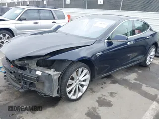 2014 Tesla Model S 60 with VIN 5YJSA1H10EFP30234, listed as a IAAI auction lot 42182249 with 186,654 mi miles and . Bid and sale history available at DreamBid. Image 2.