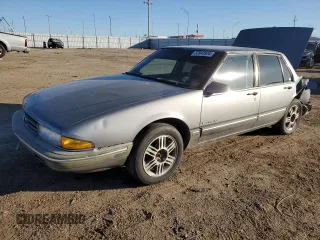 1991 Pontiac Bonneville z VIN 1G2HX54C7M1239078, wystawiony jako Copart lot #83943924 z przebiegiem 125 468 mil mil oraz Szkoda całkowita • Salvage title. Historia ofert i sprzedaży dostępna na DreamBid. Obrazek 1.