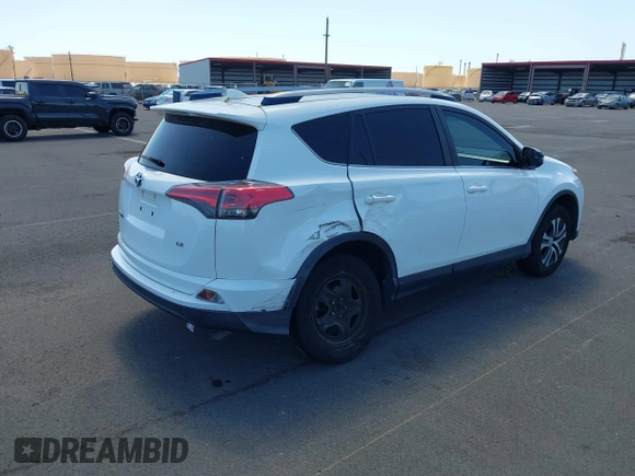 2017 Toyota RAV4 LE with VIN JTMZFREV2HJ721392, listed as a IAAI auction lot 41697170 with 59,357 mi miles and . Bid and sale history available at carsss.com. Image 4.