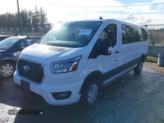 2023 Ford Transit Passenger XL with VIN 1FBAX2Y84PKB08369, listed as a IAAI auction lot 41501636 with 16,967 mi miles and . Bid and sale history available at DreamBid. Image 2.