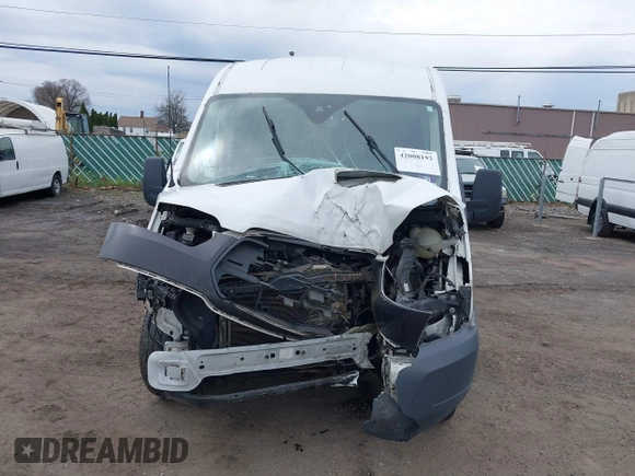 2015 Ford Transit Cargo z VIN 1FTNR2CM4FKA84584, wystawiony jako IAAI lot #42008193 z przebiegiem 224 453 mil mil oraz . Historia ofert i sprzedaży dostępna na DreamBid. Obrazek 6.