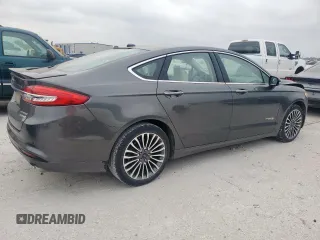 2017 Ford Fusion Hybrid Titanium with VIN 3FA6P0RU7HR388521, listed as a Copart auction lot 57318895 with 117,720 mi miles and Salvage title. Bid and sale history available at DreamBid. Image 3.