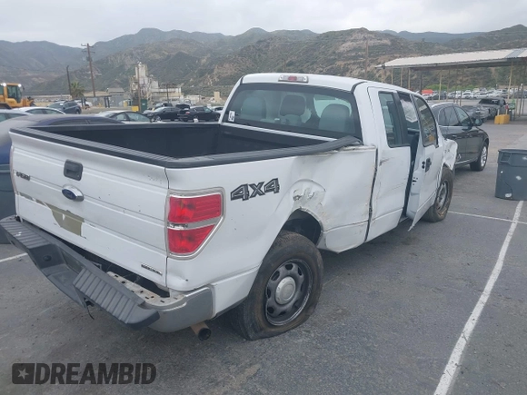 2014 Ford F-150 XL with VIN 1FTFX1CF3EKF95627, listed as a IAAI auction lot 42042775 with 208,405 mi miles and . Bid and sale history available at DreamBid. Image 4.