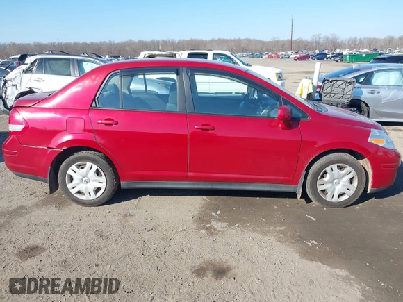 2011 Nissan Versa 1.8 S with VIN 3N1BC1AP2BL360106, listed as a IAAI auction lot 41667730 with 210,848 mi miles. Bid and sale history available at carsss.com. Image 14.